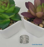 Criss cross adjustable ring